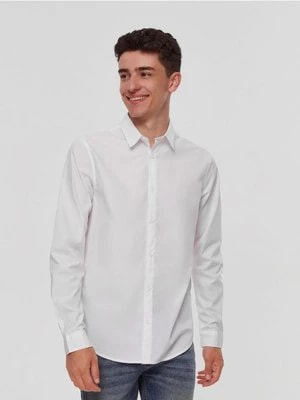 Zdjęcie produktu Gładka koszula slim fit biała House