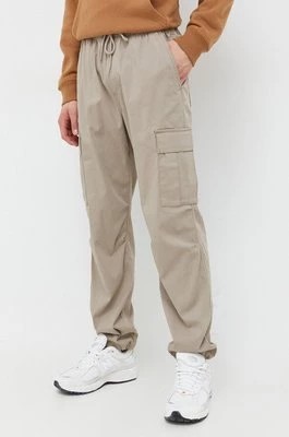 Zdjęcie produktu Hollister Co. spodnie męskie kolor beżowy w fasonie cargo