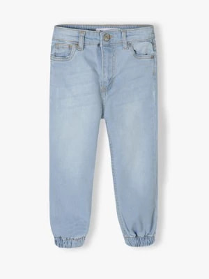 Zdjęcie produktu Jasne spodnie jeansowe typu joggery dziewczęce Minoti