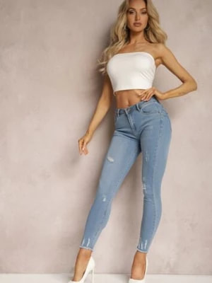 Zdjęcie produktu Jasnoniebieskie Jeansy Modelujące Push Up Ozdobione Przedarciami Qandara