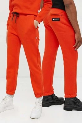 Zdjęcie produktu Kangol spodnie dresowe unisex kolor pomarańczowy gładkie