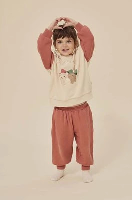 Zdjęcie produktu Konges Sløjd spodnie dresowe bawełniane dziecięce kolor czerwony gładkie