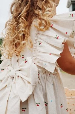 Zdjęcie produktu Konges Sløjd sukienka bawełniana dziecięca kolor beżowy mini rozkloszowana