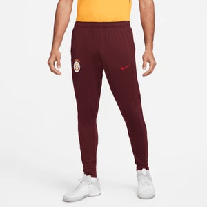 Zdjęcie produktu Męskie spodnie piłkarskie Nike Dri-FIT Galatasaray Strike - Czerwony