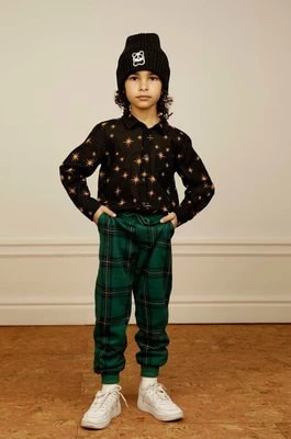 Zdjęcie produktu Mini Rodini spodnie dresowe bawełniane dziecięce kolor zielony wzorzyste