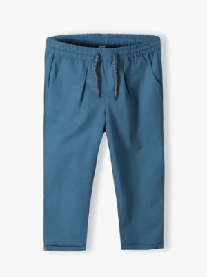 Zdjęcie produktu Niebieskie klasyczne długie spodnie dla chłopca regular 5.10.15.
