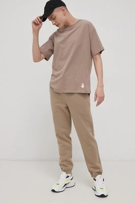 Zdjęcie produktu OCAY Spodnie bawełniane męskie kolor beżowy gładkie