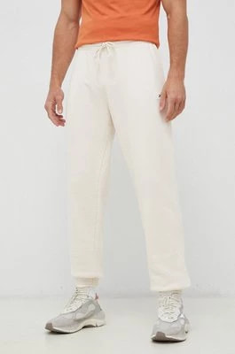 Zdjęcie produktu Reebok Classic spodnie dresowe bawełniane kolor beżowy gładkie HS9153-NONDYE