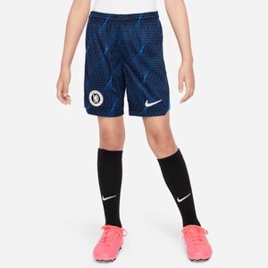 Zdjęcie produktu Spodenki piłkarskie dla dużych dzieci Nike Dri-FIT Chelsea F.C. Stadium 2023/24 (wersja wyjazdowa) - Niebieski