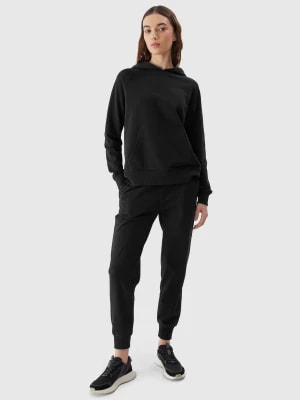 Zdjęcie produktu Spodnie dresowe joggery damskie - czarne 4F