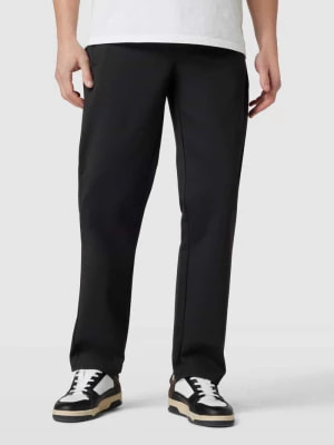 Zdjęcie produktu Spodnie dresowe o luźnym kroju z nadrukiem z logo No Bystanders