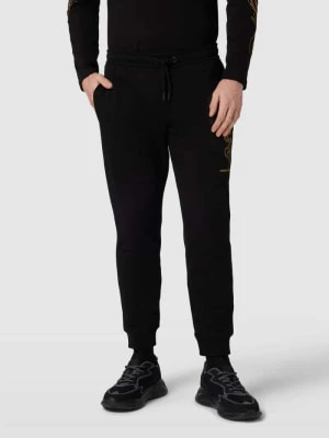 Zdjęcie produktu Spodnie dresowe z detalem z motywem model ‘Chinese Dragon’ Armani Exchange