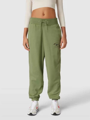 Zdjęcie produktu Spodnie dresowe z nadrukiem z logo Nike