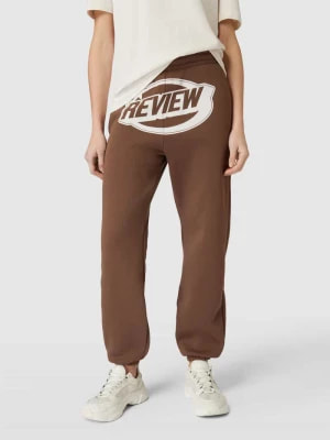 Zdjęcie produktu Spodnie dresowe z nadrukiem z logo Review