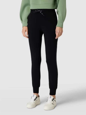 Zdjęcie produktu Spodnie dresowe ze scuby Guess Activewear