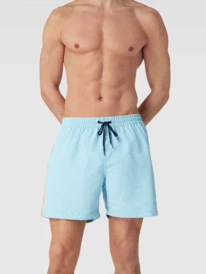 Zdjęcie produktu Spodnie kąpielowe z paskami w kontrastowym kolorze Quiksilver