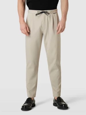 Zdjęcie produktu Spodnie materiałowe o kroju tapered fit z tunelem CK Calvin Klein