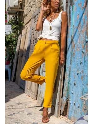 Zdjęcie produktu Gunes Kizi Spodnie w kolorze żółtym rozmiar: 36