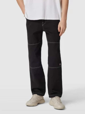 Zdjęcie produktu Spodnie ze szwami w kontrastowym kolorze model ‘Hem’ Champion