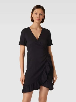 Zdjęcie produktu Sukienka kopertowa o długości do kolan z dołem obszytym falbaną model ‘HAYA’ Vero Moda