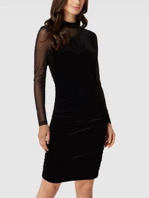 Zdjęcie produktu Sukienka o długości do kolan z przezroczystym materiałem wierzchnim model ‘Sachi’ MbyM