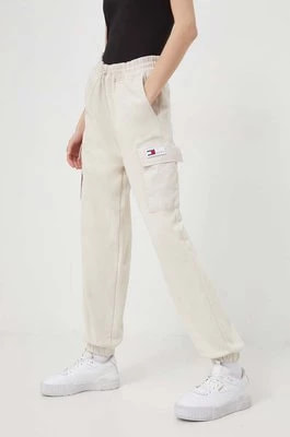 Zdjęcie produktu Tommy Jeans spodnie dresowe kolor beżowy gładkie DW0DW17313