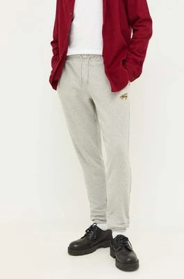 Zdjęcie produktu Tommy Jeans spodnie dresowe kolor szary melanżowe