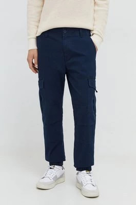 Zdjęcie produktu Tommy Jeans spodnie męskie kolor granatowy DM0DM18342