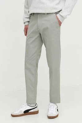 Zdjęcie produktu Tommy Jeans spodnie męskie kolor zielony w fasonie chinos DM0DM19455