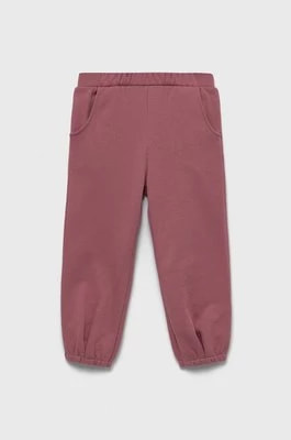 Zdjęcie produktu United Colors of Benetton spodnie dresowe bawełniane dziecięce kolor różowy gładkie