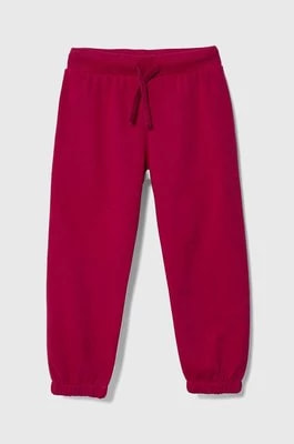 Zdjęcie produktu United Colors of Benetton spodnie dresowe dziecięce kolor różowy wzorzyste