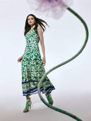 Zdjęcie produktu Zielona wiskozowa sukienka z kopertowym dekoltem TARANKO